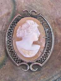 Circa 1910-1925 Art Deco Edwardian hand carved Psyche Goddess shell Marked Silver Sterling filigree brooch/pendant, signed by the Artist