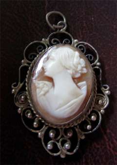 Shell Cameo. Silver ( not marked) Pendant Filigree Bezel circa 1915. Signed “MK” shell