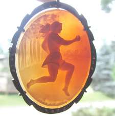 Detailed carved circa 1930 Carnelian shell - female runner Marked 800 Silver Brooch/Pendant with marcasite decor.
