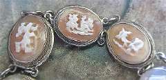 Italian Roman Mythology carved 7 little shells circa 1935 800 silver w/gold, bracelet. Signed by the Artist