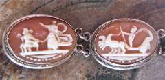 Intricately carved Roman Mythology little shells circa 1915 Embedded in the 800 silver with gold bracelet.