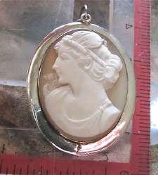 Great Quality carving shell Muse with Lira, circa 1925 800 Silver Pendant. Signed by the Artist.