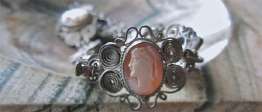 Intricate 3 cameos 1915 - 1935 shells Marked filigree Sterling Silver Bracelet with Amethysts(?)