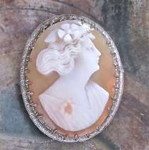 Stylishly carved shell - Late Art Deco girl from 1915 - 1935 Filigree unmarked Silver Brooch. Signed by the Artist.