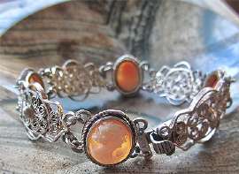 Superiorly hand carved shells from 1930-1940 In 800 Silver Filigree Bracelet & Pendant Set.