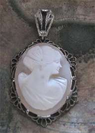 Edwardian/Post Edwardian Art Deco hand carved shell cameo Marked Silver Stearling filigree Pendant circa 1910-1925.