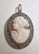 Edwardian well carved shell - Art Nouveau style woman from 1910th With diamond(?) cuts unmarked Silver Pendant. Signed.