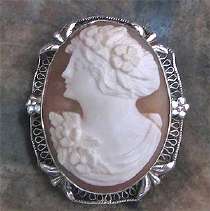 From the 1930 adjusted carving Profile shell Marked Silver Sterling Filigree Brooch