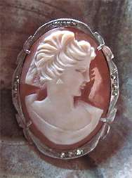 Hand carved adjusted & signed Italian shell from the 1950th 800 marked Silver with marcasite brooch/pendant.