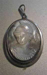 Hand carved Athena Palada in Antique helmet from the 1915-1940 Embedded in the Mother Pearl Silver/Gold brooch/pendant.