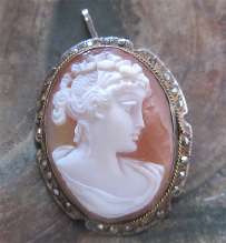 Well hand carved & signed shell from the 1910-1925 Unmarked Silver filigree Art Deco brooch.