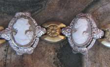 6 well hand carved portraits, circa 1940 Marked 800 Silver & Gold Bracelet.