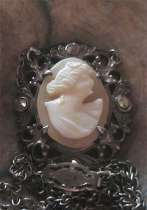 Hand carved Psyche Goddess of Soul shell, from the 1920th Silver with marcasite UNCAS Mfg. pendant, with 22” chain.