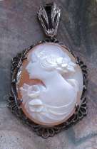 Greatly carved Art Deco shell circa 1910-1930 Patina Silver Sterling Filigree pendant.