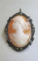 (L) Hand Carved/Signed shell circa 1930th - 1940th 800 Silver marcasite w/patina pendant/brooch.