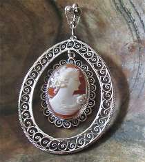 Greatly carved & signed by Artist shell from 1930th - 1950th Filigree Decorative Silver unique double framed pendant.