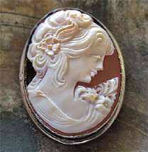 Hand carved/signed/traced Carnelian shell - girlish profile. Set in hallmarked 800 Silver pendant/brooch from 1970th .
