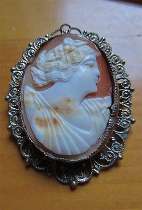 Well hand carved/signed by Artist circa 1920th shell. Unmarked Silver Filigree Brooch/Pendant.
