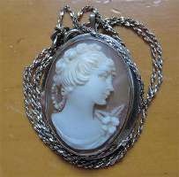 Well hand carved profile Sardonyx shell. Signed by the Artist 925 Silver pendant/brooch with the chain. Circa 1970