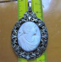 Museum hand carved Coral stone - Classic woman’s profile Unmarked Art Nouveau hand etched Silver pendant.