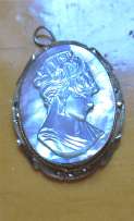 Hand carved Mother Pearl profile from the 1960th In Silver/Gold w/marcasite pendant from Italy.