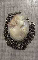 Hand carved/signed shell - female profile circa 1920th. Silver Sterling pendant with marcasite decoration & chain 18”.