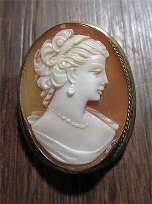 Well hand carved shell circa 1930th-1950th Silver/Gold Plated brooch/pendant.