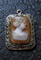 Hand carved Art Deco shell circa 1910th - 1920th. Silver/Sterling with marcasite etched pendant intricate work.