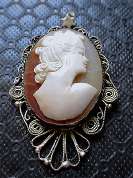 Hand Carved shell from circa 1930th - 1950th. Silver plated filigree w/Star David Pendant.