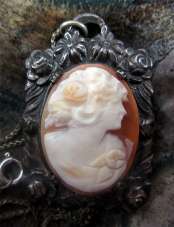 Nicely Framed Silver Art Deco Shell Pendent with 17” marked Sterling chain